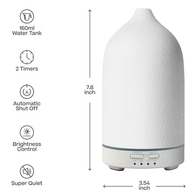 White ceramic aromatherapy stone diffuser with textured finish and beige base with control buttons. - Aromatherapy Stone Diffuser + 3x Diffuser Drops | BFCM Exclusive Bundle - Hope / White - Doctor Aromas