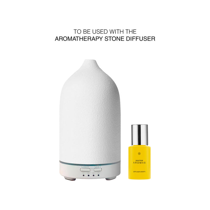 White ceramic aromatherapy stone diffuser with small yellow glass fragrance bottle labeled "Spirit". - Diffuser Drops x3 | BFCM Exclusive Bundle - Hope - Doctor Aromas