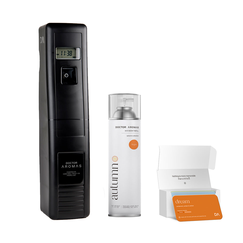 Black vertical A/C scenting device with digital display, tall white aerosol can, and small open white box with orange label. - A/C Scenting System Pro | Alegria - Alegria - Doctor Aromas