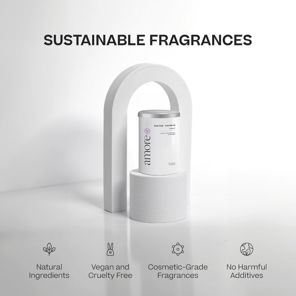 White Amore candle in minimalist white container displayed on a modern white stand with "Sustainable Fragrances" text above. - Candle | Amore - Amore - Doctor Aromas