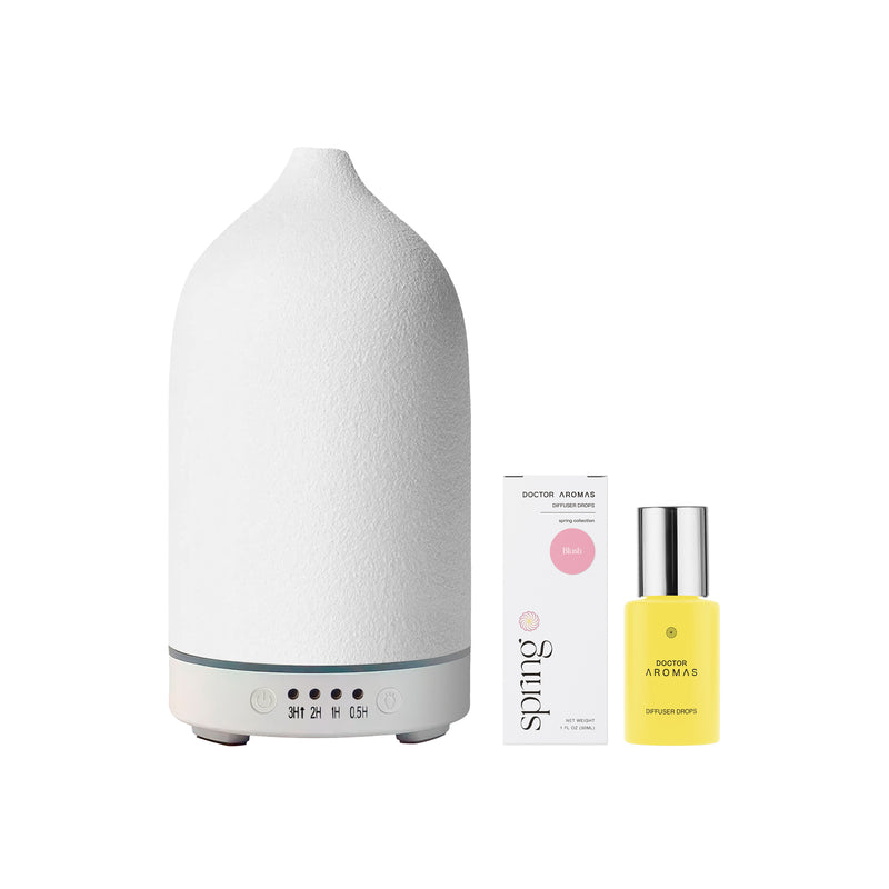 White ceramic stone diffuser with rounded top and wooden base, paired with yellow essential oil bottle and pink box. - Aromatherapy Stone Diffuser | Blush - Blush / White - Doctor Aromas