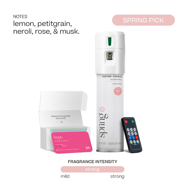 White cylindrical Doctor Aromas A/C scenting system spray dispenser with pink "Spring" fragrance label, black remote. - Doctor Aromas A/C Scenting System - A/C Spray Dispenser with Remote Control, Customizable Scent Experience, Vegan & Cruelty-Free, 17.1 oz Fragrance Oil, Whole Home Freshener, Battery Operated, Non-Toxic, Cosmetic Grade Scents - Hope® - Doctor Aromas