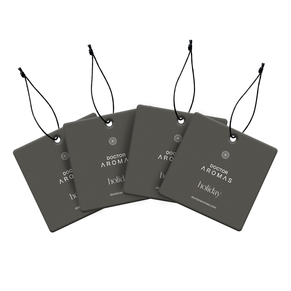 Set of four dark gray square car perfume air fresheners with black strings and white holiday text. - Car Perfume x4 Bundle | Holiday - Holiday - Doctor Aromas