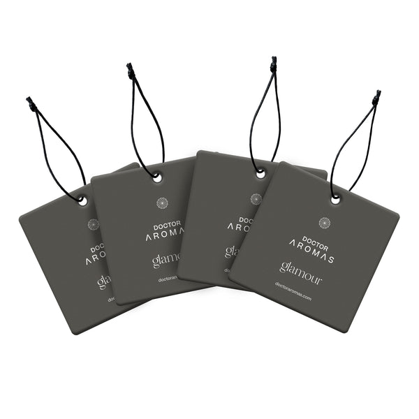 Set of four dark gray square car perfumes with black adjustable hanging cords and white "Glamour" text on front. - Car Perfume x4 Bundle | Glamour - Glamour - Doctor Aromas