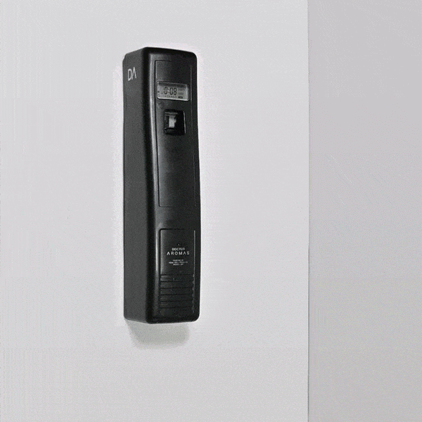 Black wall-mounted DA Pro Dispenser with digital display and sensor panel on white background. - DA | Pro Dispenser - Default Title - Doctor Aromas