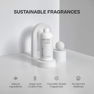Two white mist refill bottles with minimal black text, displayed on white geometric stands against a light gray background. - Mist Refill Twin Pack | Glamour - Glamour - Doctor Aromas