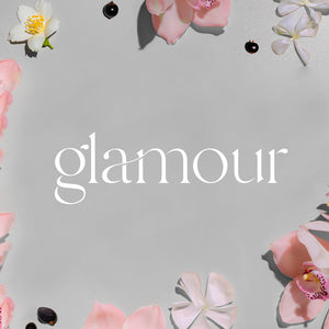 White and pink flowers with black beads on a gray background and the word Glamour in white text. - Oil Reed Diffuser & Refill Bundle | Glamour - Glamour - Doctor Aromas
