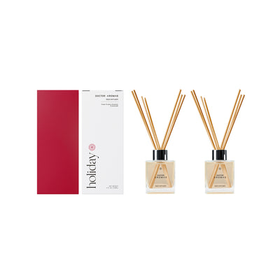 Twin pack oil reed diffusers with square glass bottles and natural wood reeds, boxed in red and white holiday packaging. - Oil Reed Diffuser Twin Pack | Holiday - Holiday - Doctor Aromas