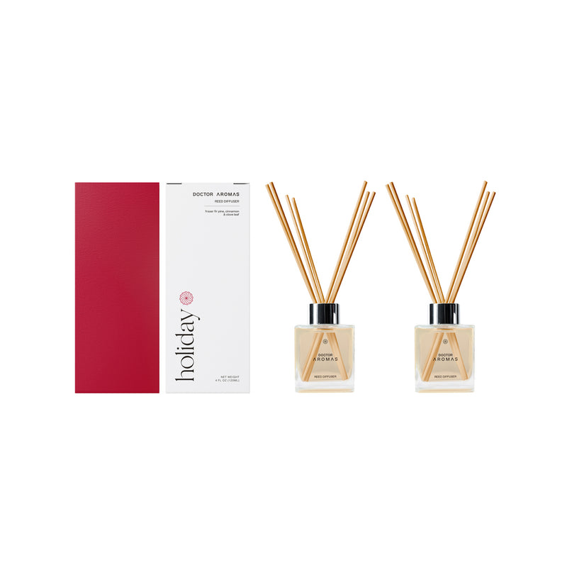 Twin pack oil reed diffusers with square glass bottles and natural wood reeds, boxed in red and white holiday packaging. - Oil Reed Diffuser Twin Pack | Holiday - Holiday - Doctor Aromas