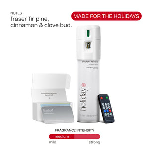 White Doctor Aromas A/C spray dispenser with "Holiday" label, remote control, and open fragrance oil box. - Doctor Aromas A/C Scenting System - A/C Spray Dispenser with Remote Control, Customizable Scent Experience, Vegan & Cruelty-Free, 17.1 oz Fragrance Oil, Whole Home Freshener, Battery Operated, Non-Toxic, Cosmetic Grade Scents - Hope® - Doctor Aromas