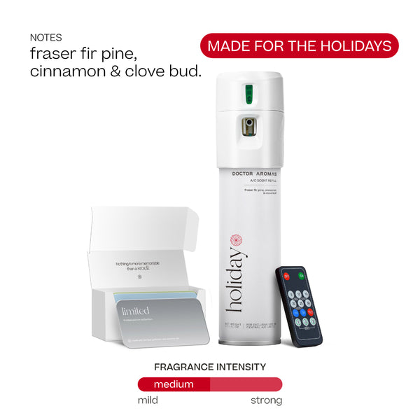 White Doctor Aromas A/C spray dispenser with "Holiday" label, remote control, and open fragrance oil box. - Doctor Aromas A/C Scenting System - A/C Spray Dispenser with Remote Control, Customizable Scent Experience, Vegan & Cruelty-Free, 17.1 oz Fragrance Oil, Whole Home Freshener, Battery Operated, Non-Toxic, Cosmetic Grade Scents - Hope® - Doctor Aromas