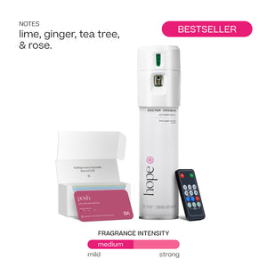 White Doctor Aromas A/C spray dispenser with remote and pink-labeled Hope® fragrance oil box. - Doctor Aromas A/C Scenting System - A/C Spray Dispenser with Remote Control, Customizable Scent Experience, Vegan & Cruelty-Free, 17.1 oz Fragrance Oil, Whole Home Freshener, Battery Operated, Non-Toxic, Cosmetic Grade Scents - Hope® - Doctor Aromas