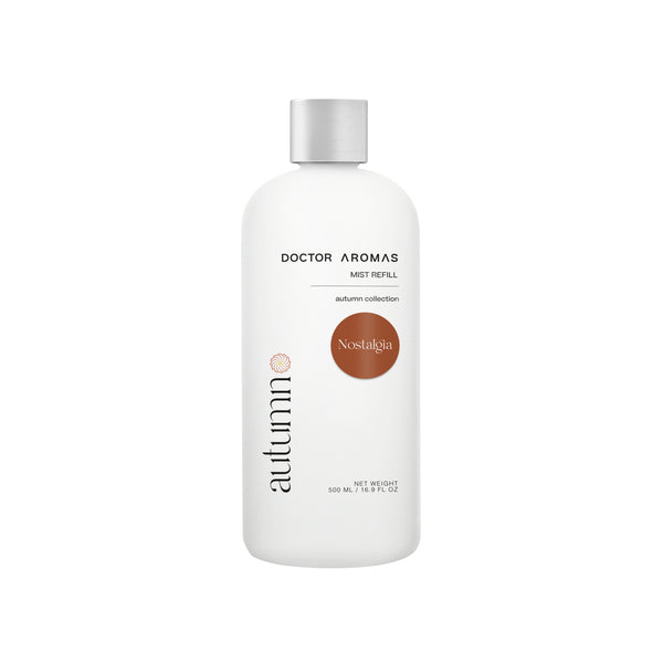 White cylindrical bottle with silver cap, labeled "Doctor Aromas Nostalgia" and "autumno" in orange text. - Mist Refill | Nostalgia - Nostalgia / 100 ml - Doctor Aromas