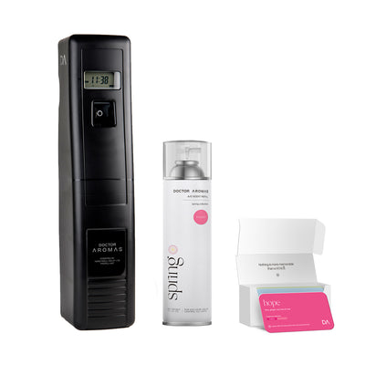 Black vertical A/C scenting device next to silver pomelo-scent spray can and open box with pink refill cartridge inside. - A/C Scenting System Pro | Pomelo - Pomelo - Doctor Aromas