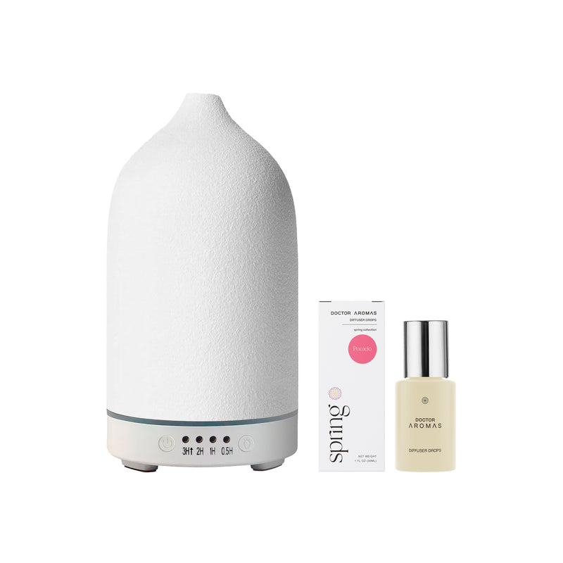 White pomelo-shaped textured aromatherapy stone diffuser with essential oil bottle and packaging. - Aromatherapy Stone Diffuser | Pomelo - Pomelo / White - Doctor Aromas