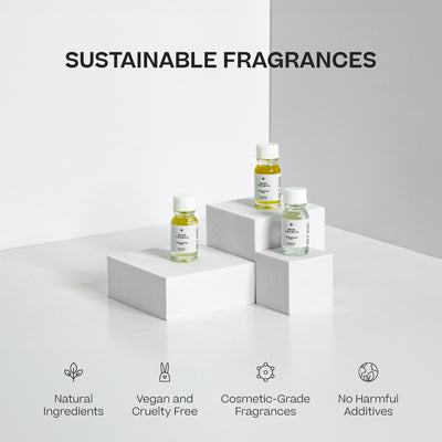 Three small clear glass bottles of Portable Diffuser Refills with white labels and yellow accents on white geometric. - Portable Diffuser Refills Pack of Three | Signature Collection - Signature Collection - Doctor Aromas
