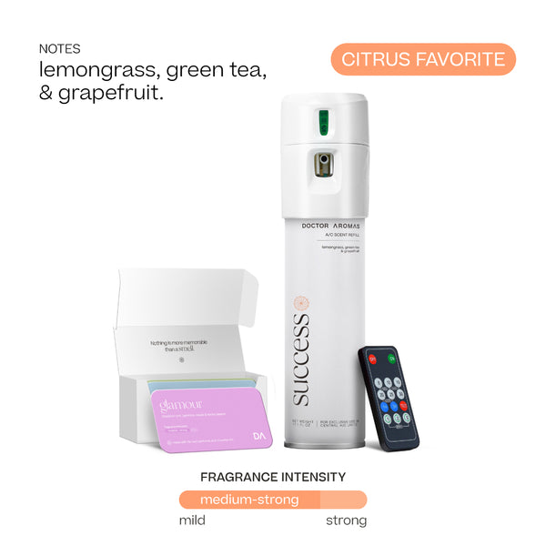 White Doctor Aromas A/C spray dispenser with Success fragrance label, remote control, and open purple scent card box. - Doctor Aromas A/C Scenting System - A/C Spray Dispenser with Remote Control, Customizable Scent Experience, Vegan & Cruelty-Free, 17.1 oz Fragrance Oil, Whole Home Freshener, Battery Operated, Non-Toxic, Cosmetic Grade Scents - Hope® - Doctor Aromas