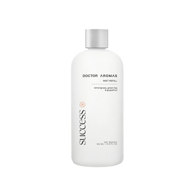 White 500ml plastic bottle of Doctor Aromas Success mist refill with silver cap and minimal black text label.
