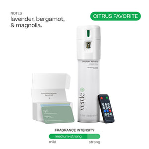 White cylindrical Doctor Aromas A/C spray dispenser with green "Verde" label, remote control, and open box of fragrance oil. - Doctor Aromas A/C Scenting System - A/C Spray Dispenser with Remote Control, Customizable Scent Experience, Vegan & Cruelty-Free, 17.1 oz Fragrance Oil, Whole Home Freshener, Battery Operated, Non-Toxic, Cosmetic Grade Scents - Hope® - Doctor Aromas